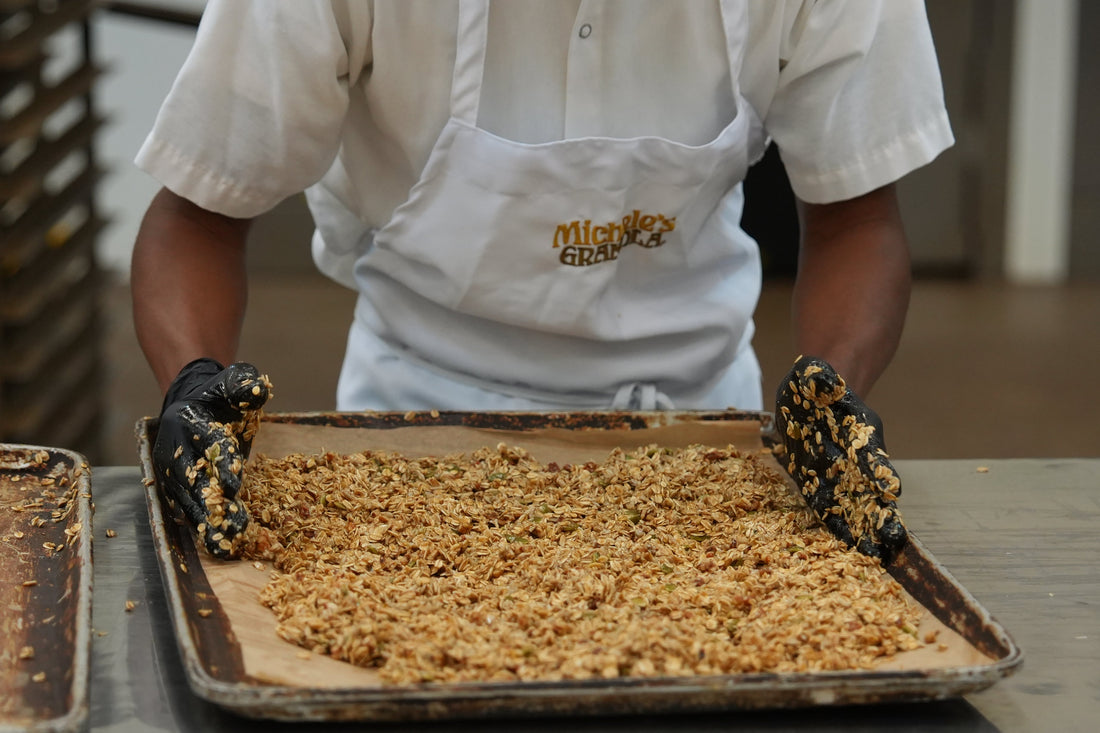A buckwheat granola mixture on a baking tray in the Michele's Granola bakery kitchen