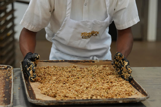 A buckwheat granola mixture on a baking tray in the Michele's Granola bakery kitchen