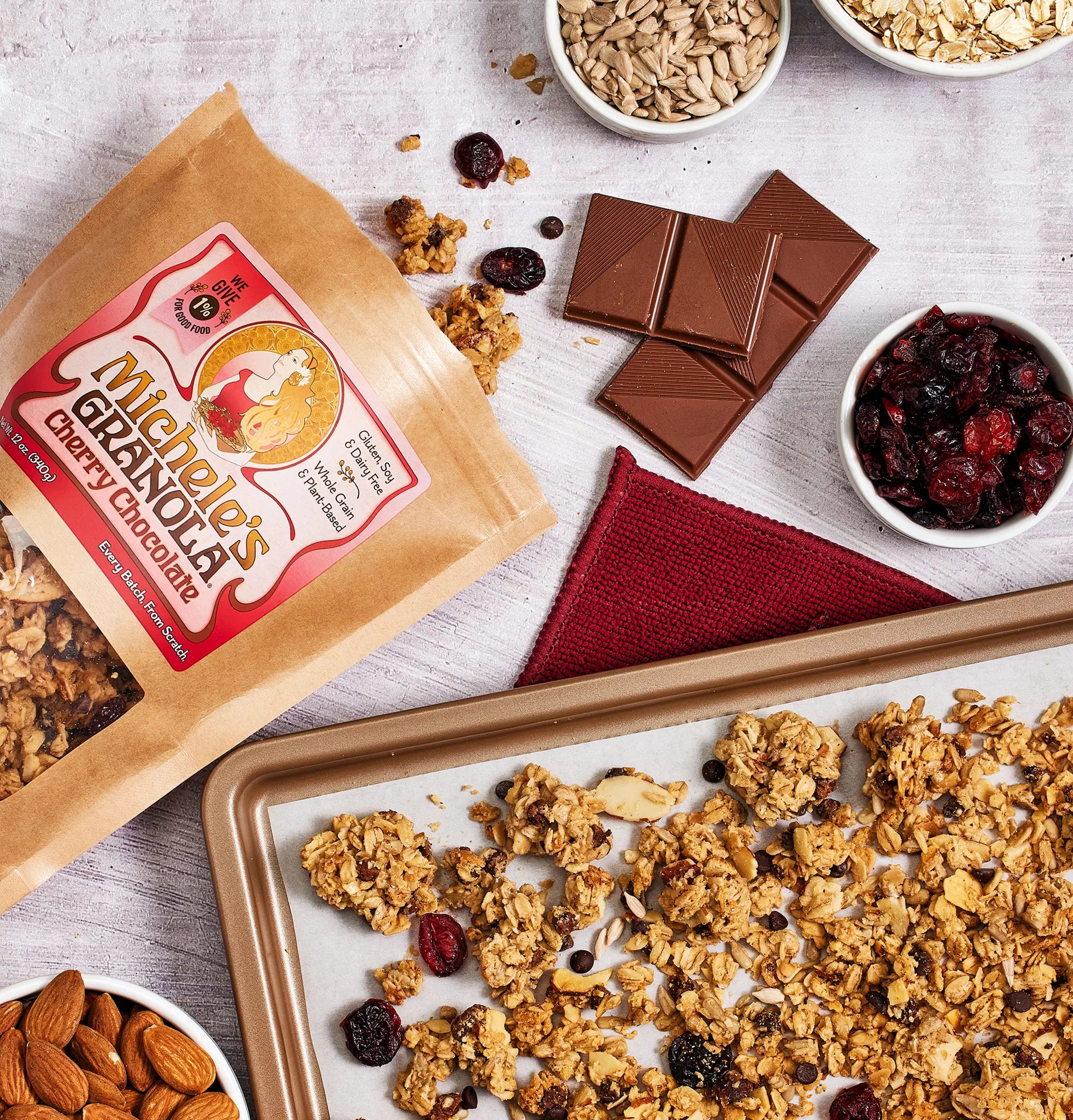 Michele's Granola with ingredients on a table